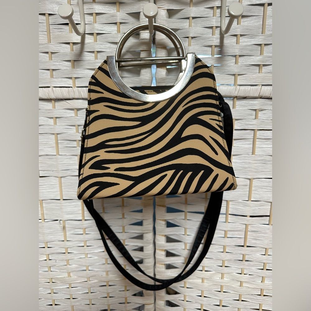 Replica mini tiger‎ print purse. Silver Metal handles adjustable strap like new